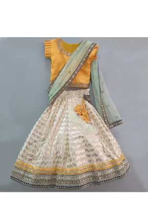 Yellow choli and off white lehenga with attached dupatta